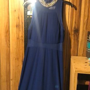 Long blue dress with beaded collar